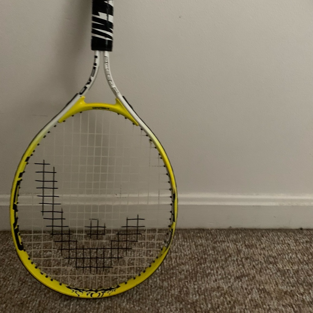 Head junior racket. Never used. Marks from storage.